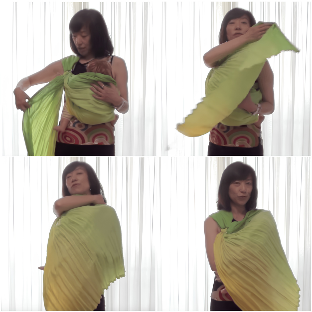 ピースリングの長いテールを授乳時のカバーにつかっている様子